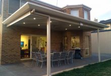 Flat roofed verandah featuring REv Cool INSULATED roofing and the new MOSSMAN gtters by Revolution Roofing to create that Pavillion look in Hillside