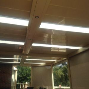 Custom downlight housing & full tracked blinds installed under one of our verandahs